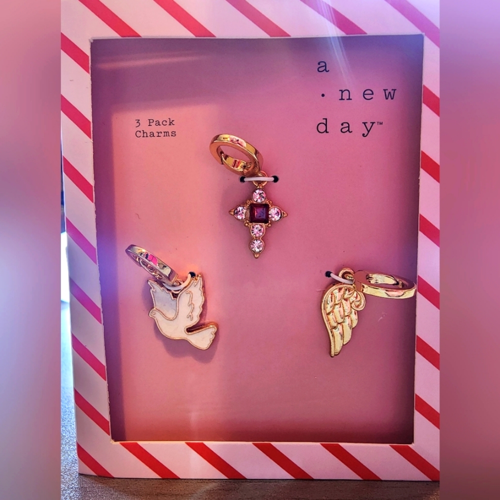 A New Day Gold Charm Set.          *BRAND NEW IN BOX*